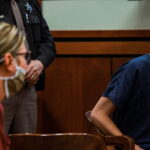 James-Crumbley-looks-at-his-wife-Jennifer-Crumbley-both-of-whom-face-four-counts-of-involuntary-manslaughter-during-a-court-procedural-hearing-in-Rochester-Hills-Michig-1024×624-1