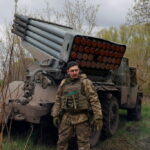 comment-dyer-A-Ukrainian-serviceman-stands-next-to-a-BM-21-Grad-multiple-rocket-launch-system-in-Kharkiv-region-1024×683-1